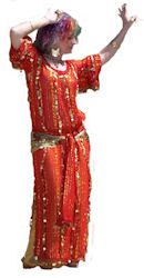 Chelydra in an orange beledi dress with gold coins.